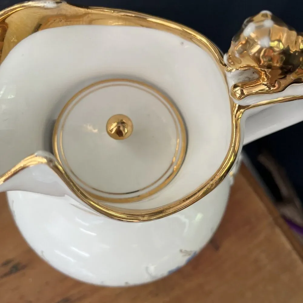 Antique Bing & Grøndahl chocolate jug in porcelain with gold lion handle w/lid